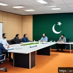 Home 23 문화콘텐츠 기획사의 성공적인 회의 진행법 - A professional meeting scene set in a modern office with a diverse group of Urdu-speaking South Asia...